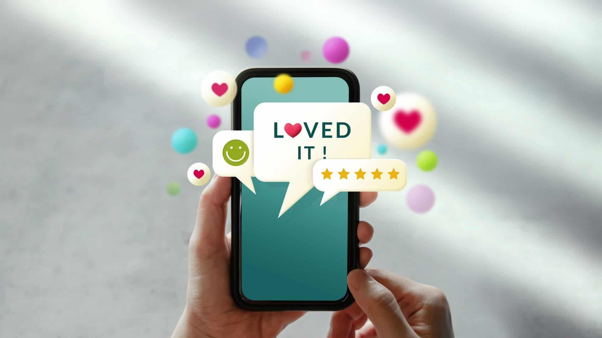 image showing a hand holding a phone with elements of positive reviews coming out of the screen in speech bubbles